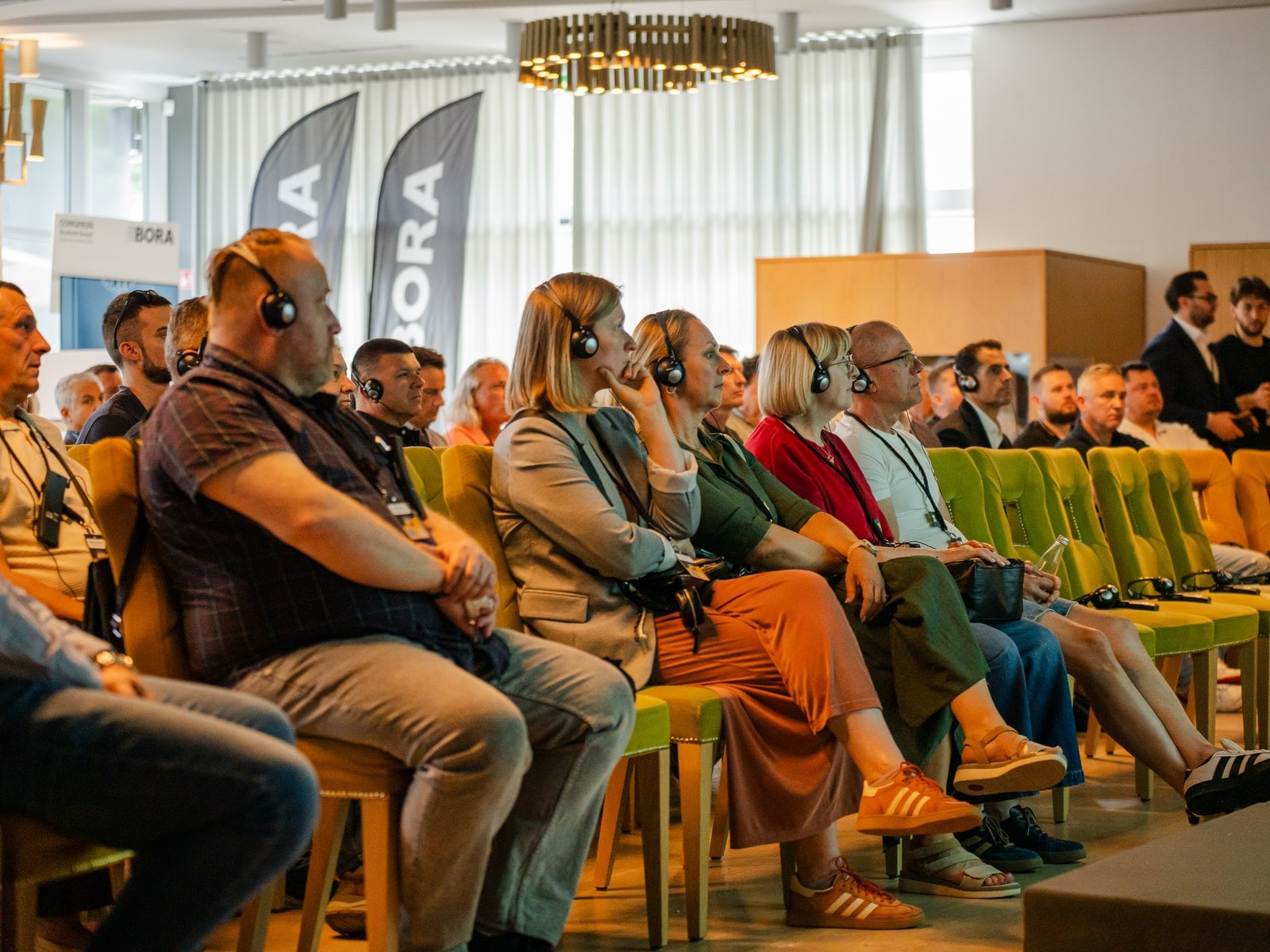 Partners with interpreting headsets at the varia Congress Southeast Europe.